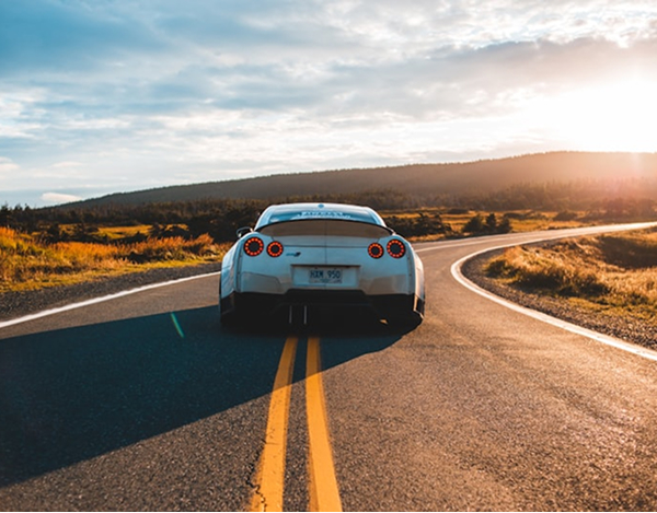 Sports car on a scenic mountain road